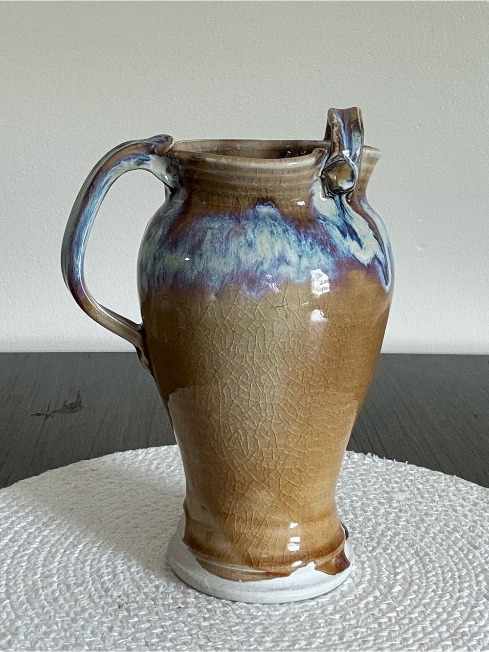 Handcrafted Brown Glazed Ceramic Pitcher with Blue Drip Accent